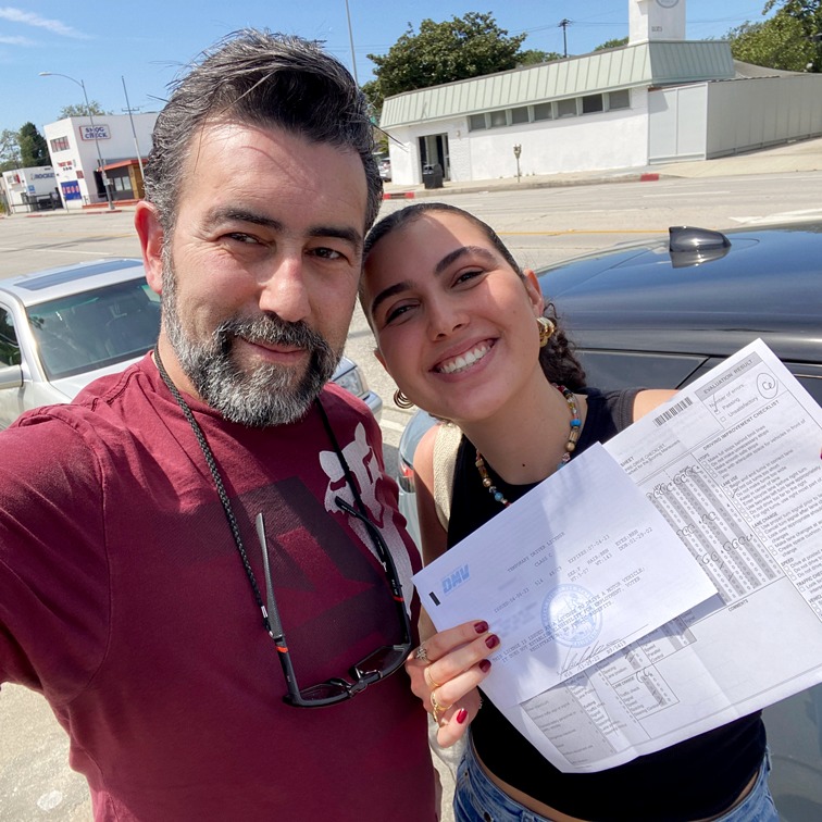 Her registration was expired. We switched to my car. She passed with 6 errors.