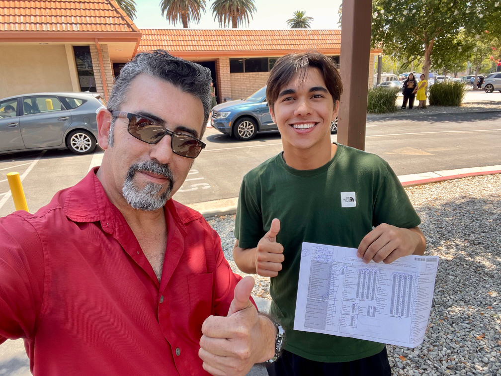 His car was missing the registration. We switched to mine. He passed anyway.